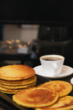 Arepas de choclo con café de la casa
