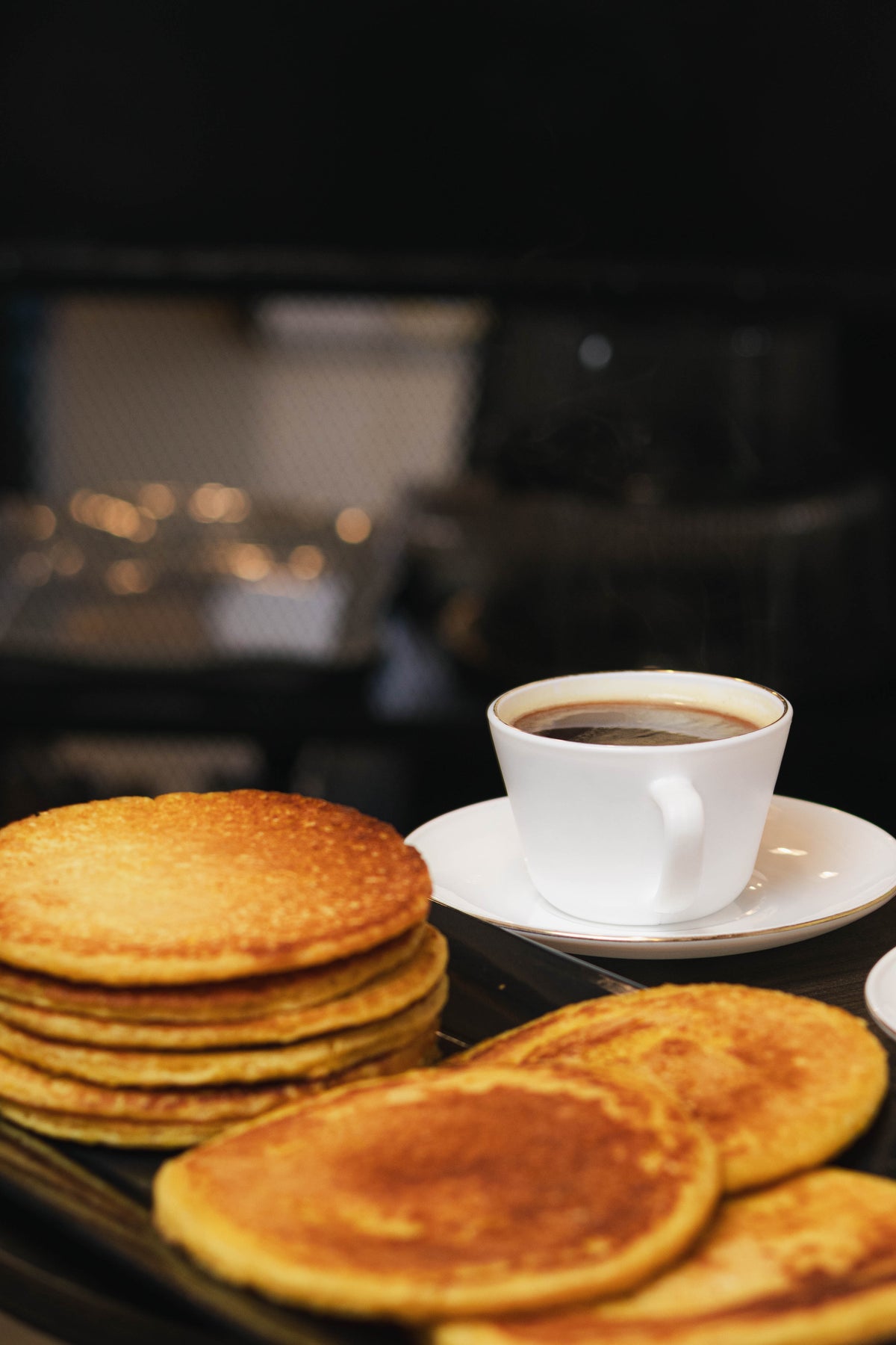 Arepas de choclo con café de la casa